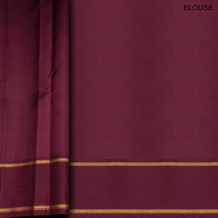 Magenta Kanjivaram silk saree with checks, maroon gold zari rettapet border and striped pallu with matching blouse