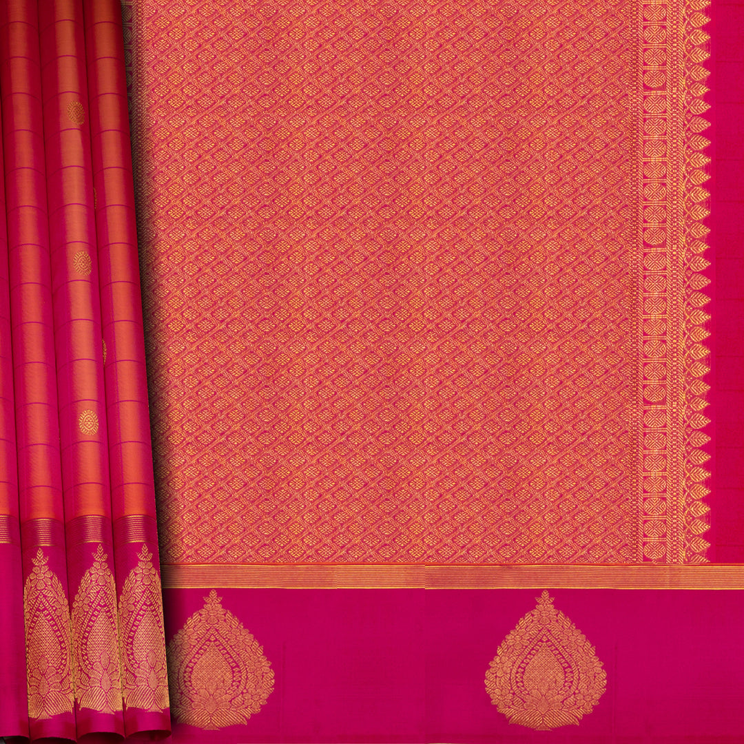 Orange Kanjivaram silk saree with checks, chakram and mango butta, magenta leaf border and vaira mookuthi pallu with matching blouse