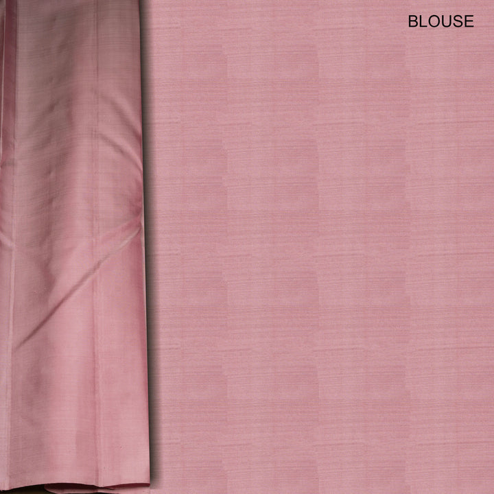 Light pink Kanjivaram silk saree with brocade body, gold and silver zari butta and triangle pallu with matching blouse