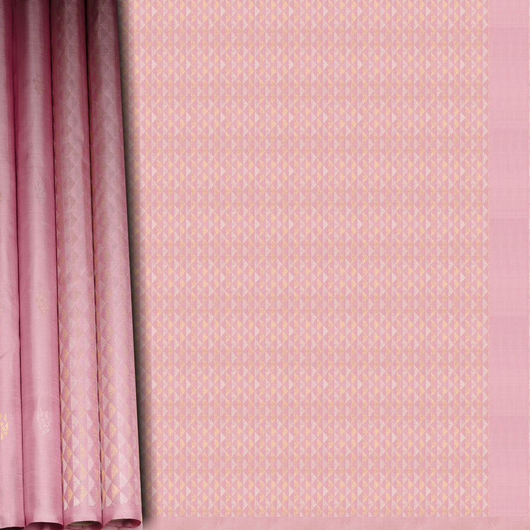 Light pink Kanjivaram silk saree with brocade body, gold and silver zari butta and triangle pallu with matching blouse
