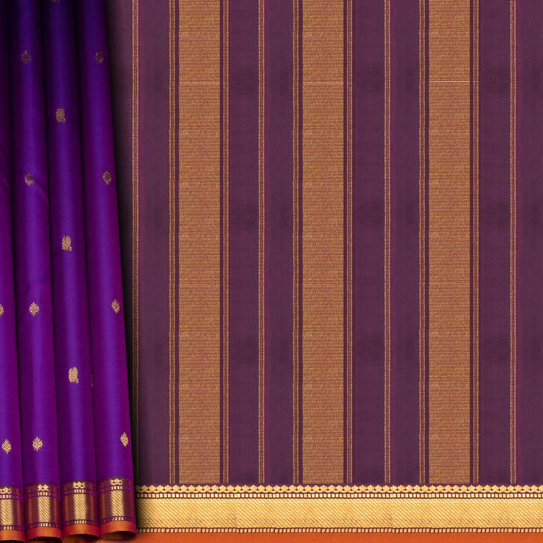 Violet Kanjivaram silk saree with diamond and annam butta, orange chevron border and gold zari striped pallu with contrast blouse