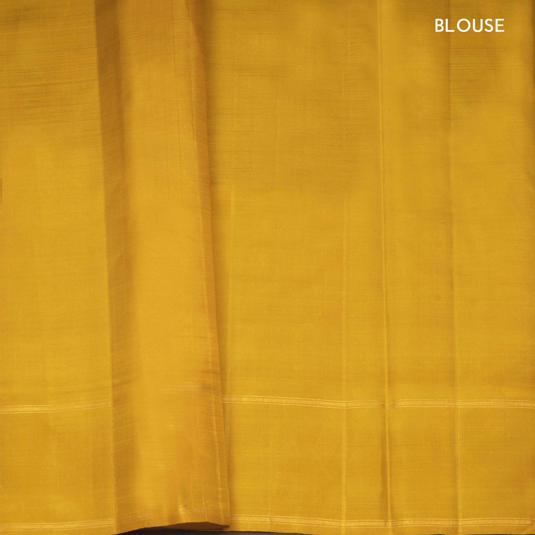 Dual-tone Sea green Kanjivaram silk saree with big checks, yellow rettapet border and gold lined pallu with matching blouse