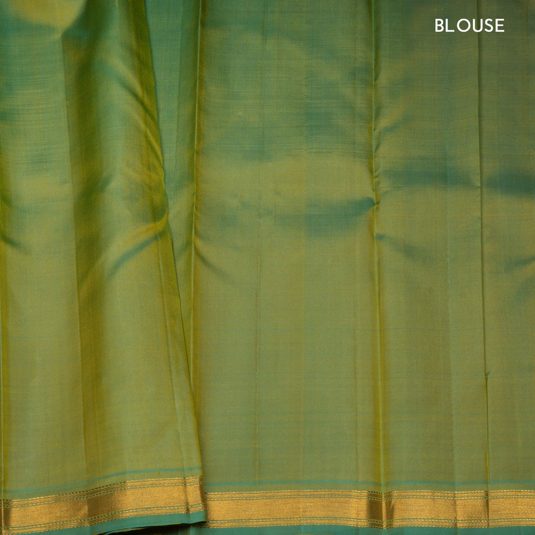 Yellow Kanjivaram silk saree with plain body, aqua blue dual-tone getti border and blue green paneled pallu with matching blouse