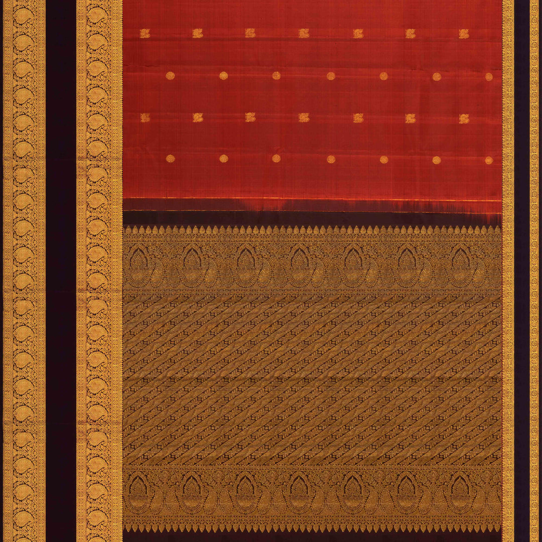 Rust orange Kanjivaram silk saree with annam and chakram butta, brown rettapet border and rich traditional pallu with matching blouse
