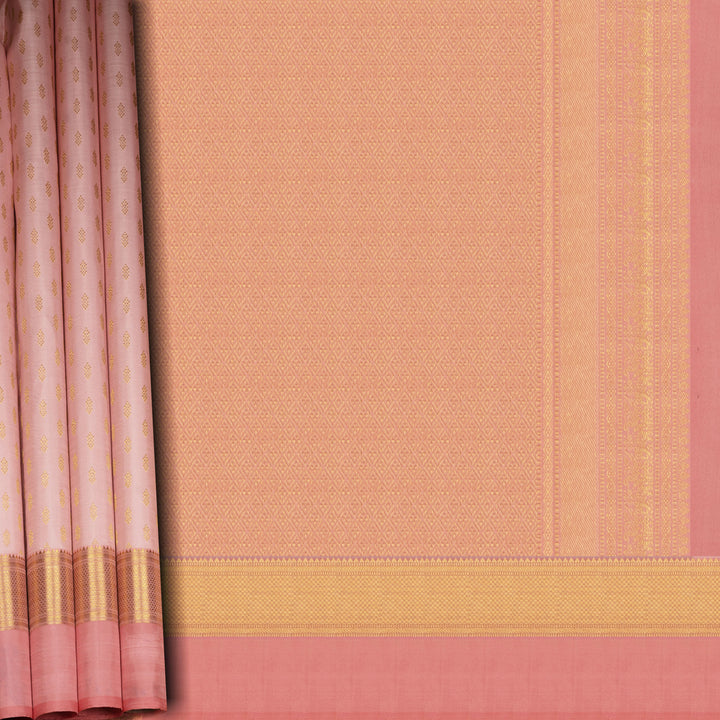 Light peach Kanjivaram silk saree with vairam buttas, peach pink border featuring temple and chevron designs, and detailed zari pallu, paired with plain blouse.