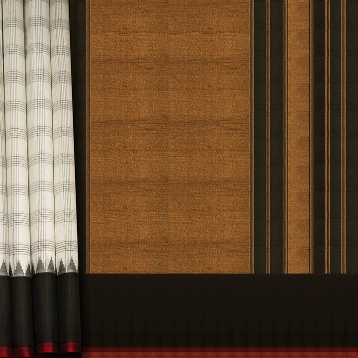 White Gadwal cotton saree with black checks, red Korvai temple border and brown pallu