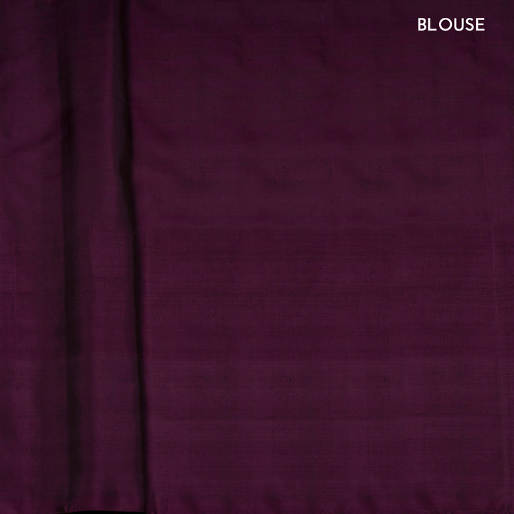 Pink handwoven Ikat soft silk saree with Banarasi floral motifs, violet Ikat border and diamond Ikat pallu