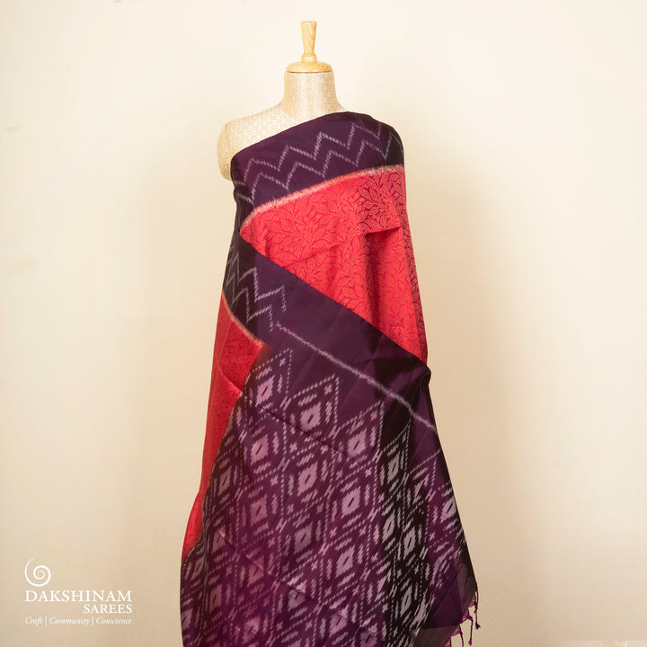 Pink handwoven Ikat soft silk saree with Banarasi floral motifs, violet Ikat border and diamond Ikat pallu