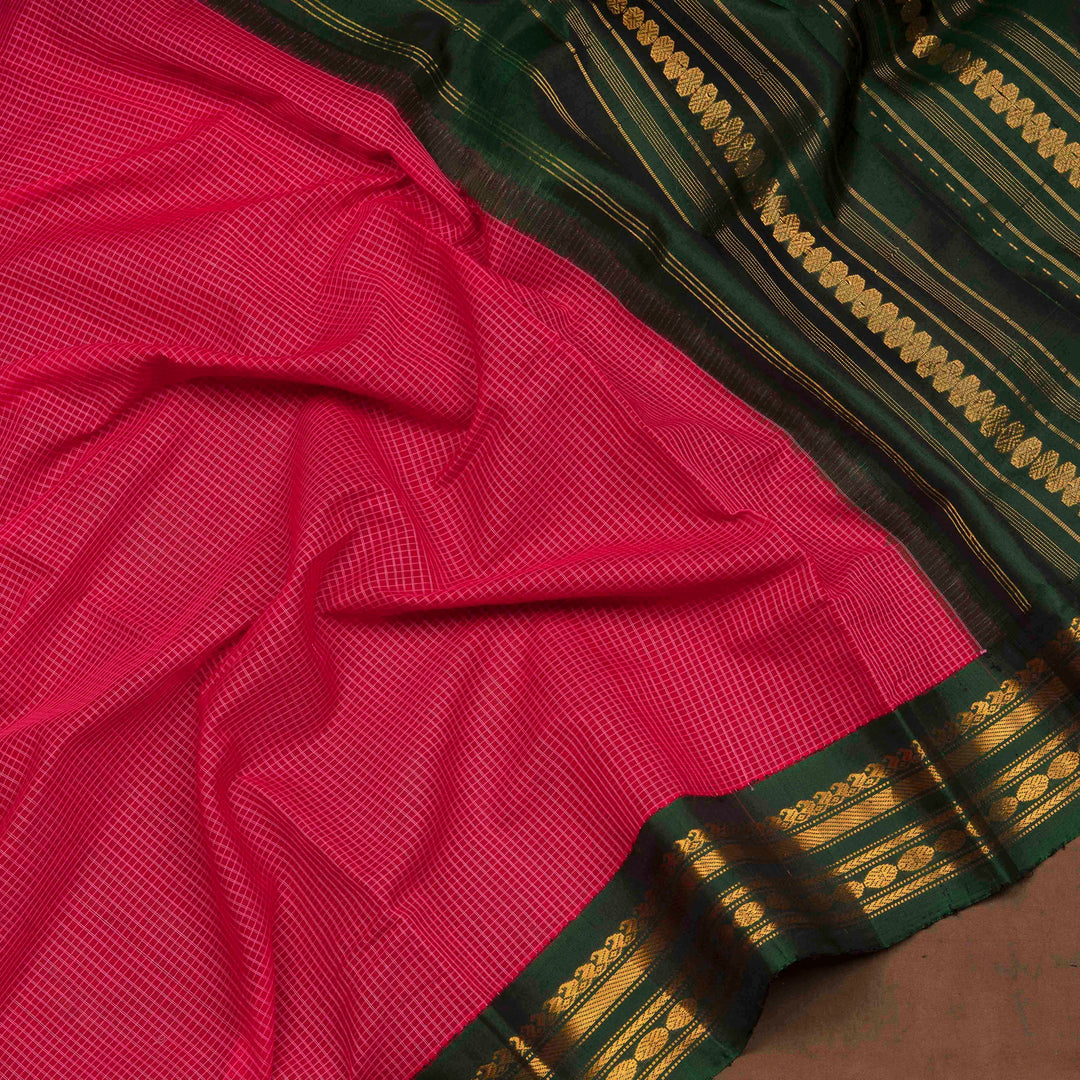 Pink checked Gadwal cotton saree with green Korvai silk border, gold zari Rudraksham motifs and green pallu