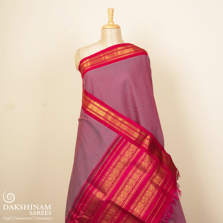 Violet checked Gadwal cotton saree with pink Korvai silk border, gold zari diamond motifs and pink silk pallu