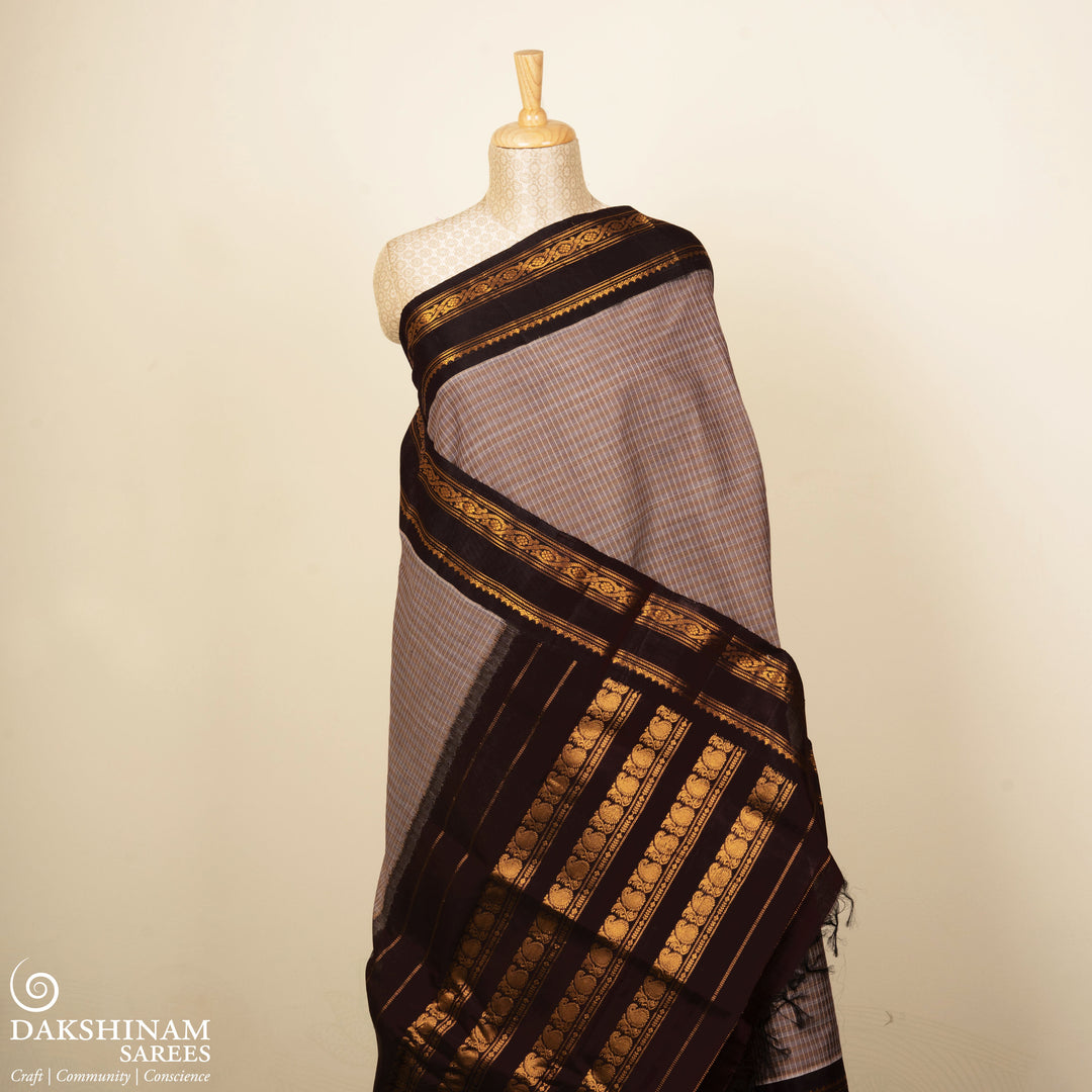Grey Gadwal cotton saree with brown stripes, coffee brown silk border, gold zari motifs and silk pallu