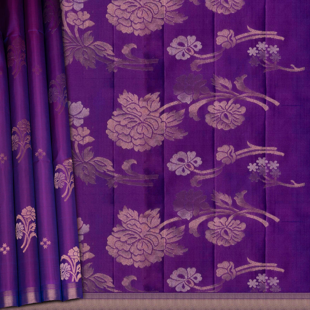 Violet handwoven soft silk saree with gold zari diamond buttas, floral motifs and rose gold zari pallu