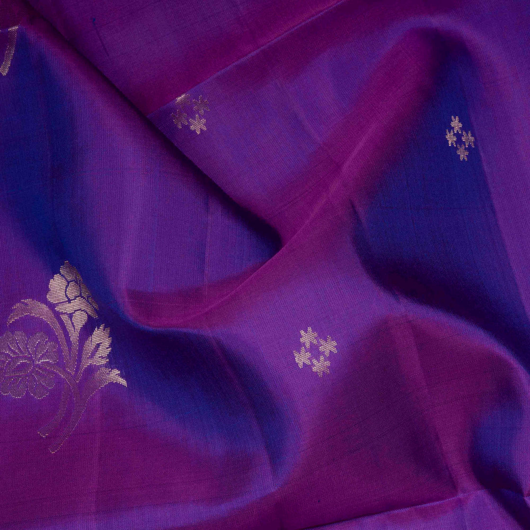 Violet handwoven soft silk saree with gold zari diamond buttas, floral motifs and rose gold zari pallu