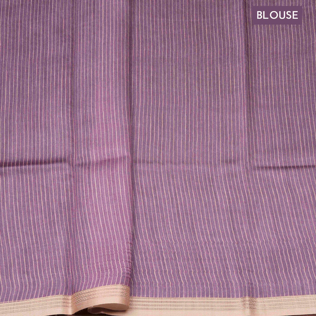 Lavender handwoven Moonga silk saree with light pink floral print, silver zari border and striped pallu