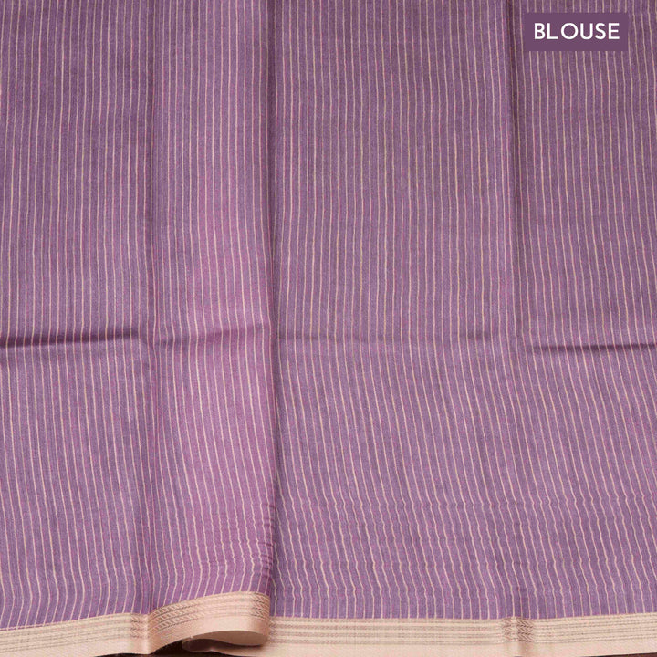 Lavender handwoven Moonga silk saree with light pink floral print, silver zari border and striped pallu
