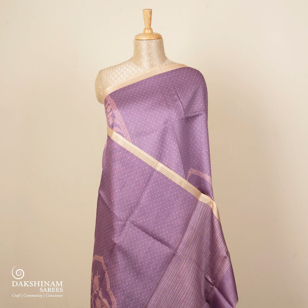 Lavender handwoven Moonga silk saree with light pink floral print, silver zari border and striped pallu