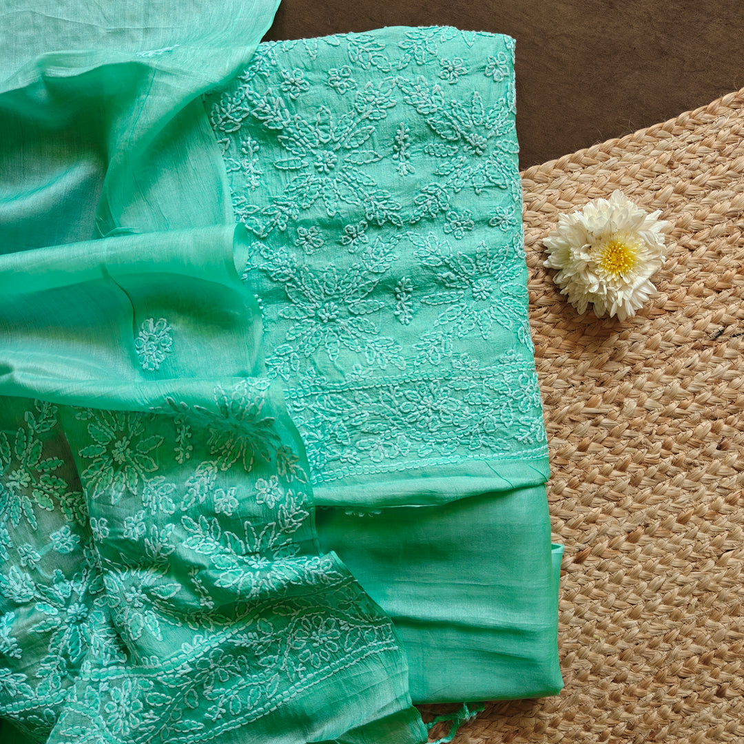 Teal green Tussar silk 3-piece suit set with hand embroidered Chikankari floral work and matching dupatta