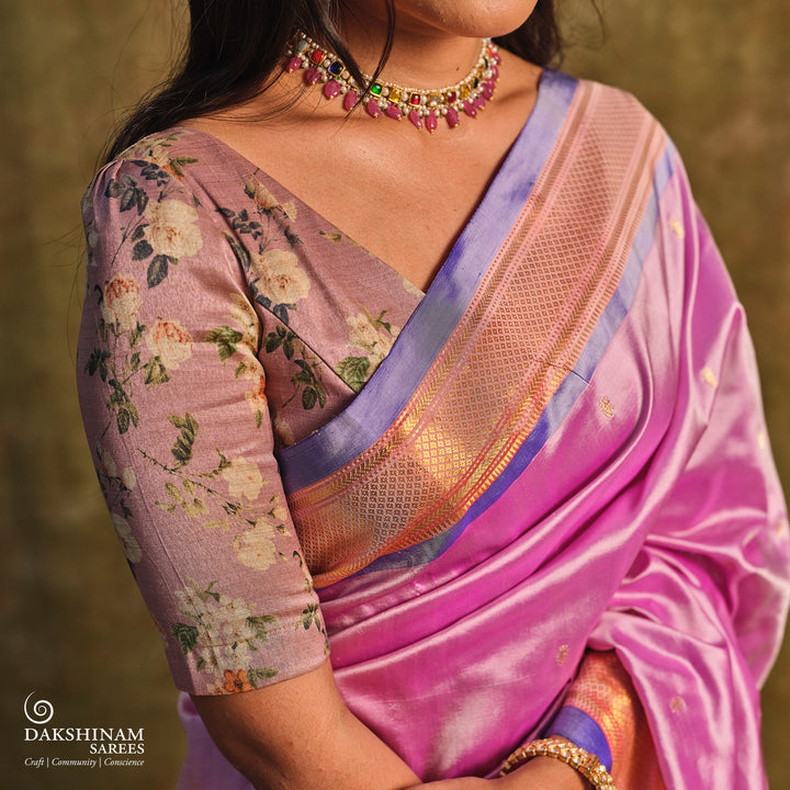 Lavender Paithani silk saree with gold zari paisley buttas, blue selvedge border with mayil motifs and traditional peacock pallu.