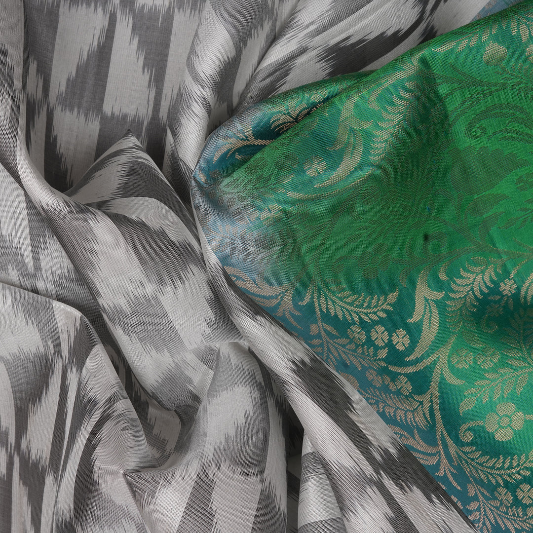 Handwoven White with Green Soft Silk Ikat Saree - 2380T011173DSL