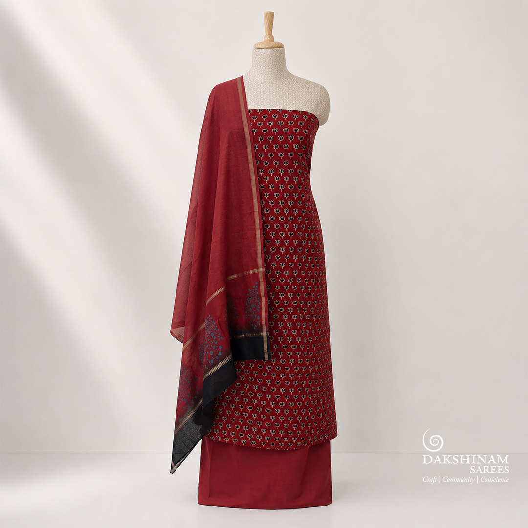 Red Ajrakh printed cotton 3-piece suit set with lotus motifs, plain red bottom and Chanderi floral dupatta