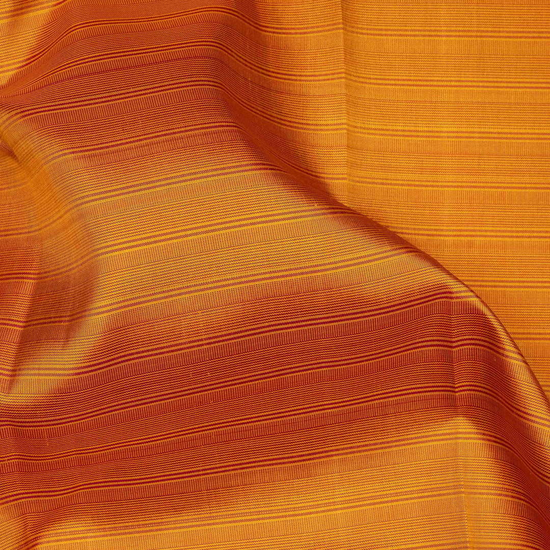 Mango yellow handwoven Kanjivaram silk saree with dark green border, gold zari and temple motifs