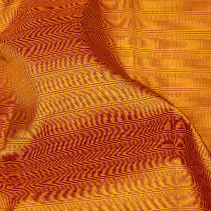 Mango yellow handwoven Kanjivaram silk saree with dark green border, gold zari and temple motifs