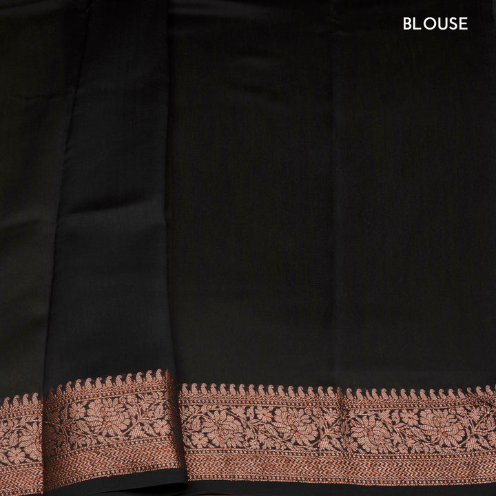 Black Chanderi silk cotton saree with white floral print, gold zari border and striped pallu