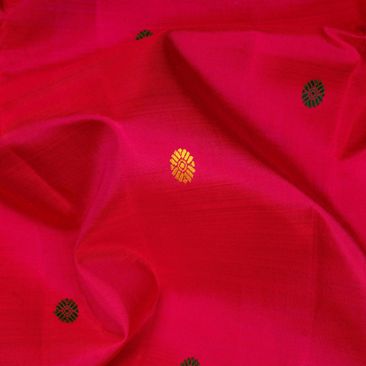 Pink handwoven Kanjivaram silk saree with parrot motifs, temple border and monotone pallu