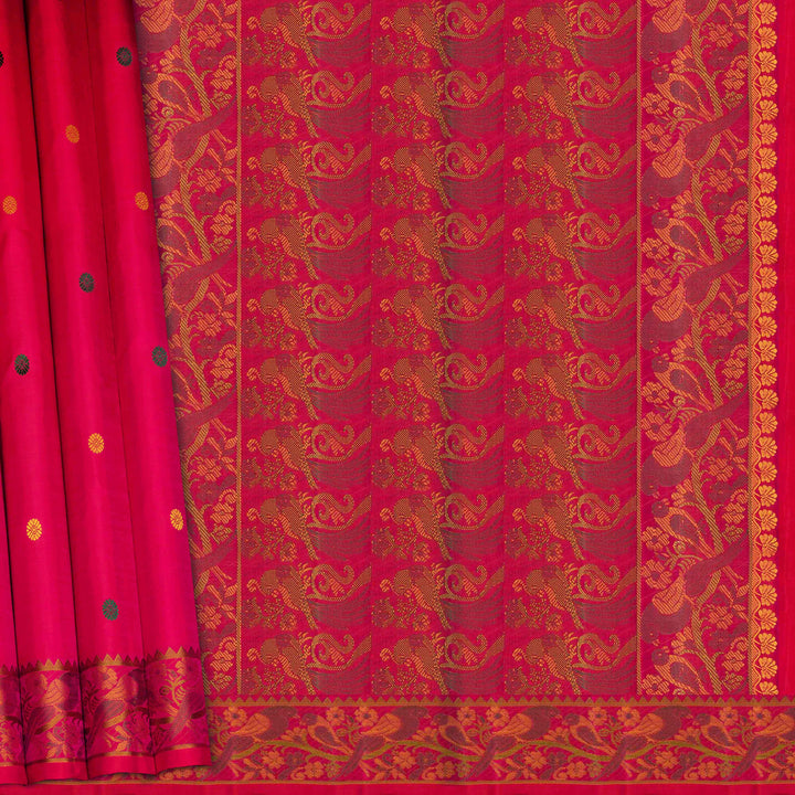 Pink handwoven Kanjivaram silk saree with parrot motifs, temple border and monotone pallu