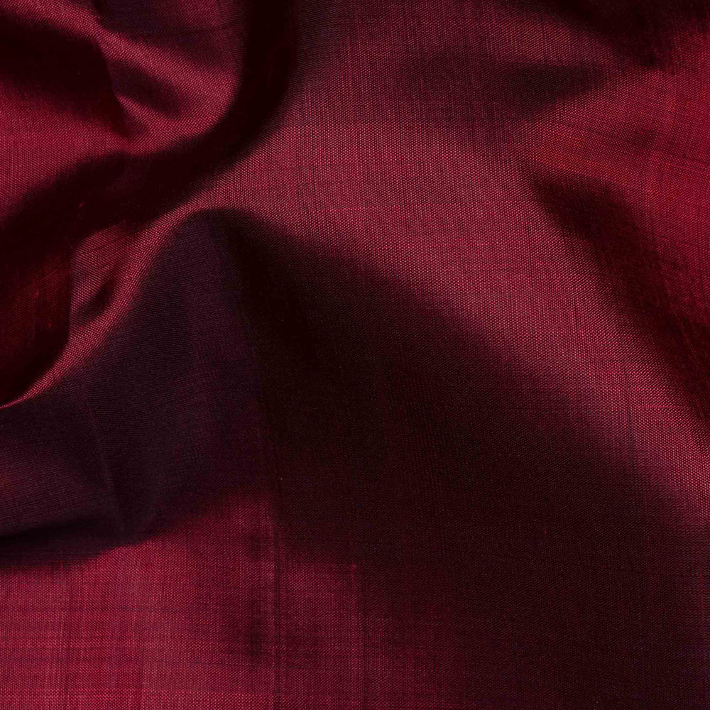 Maroon handwoven Kanjivaram silk saree with mango yellow border, gold zari and contrast pallu