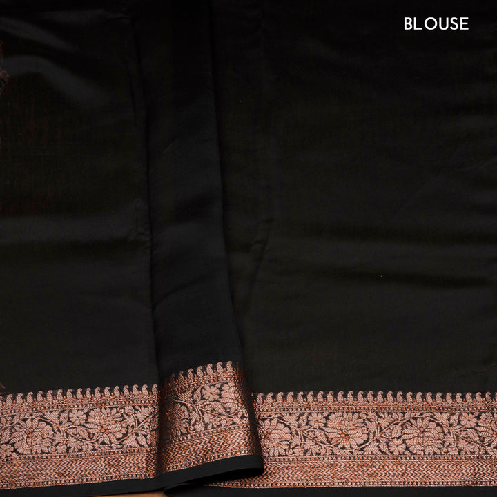 Black Chanderi silk cotton saree with white floral print, brown zari border and striped pallu
