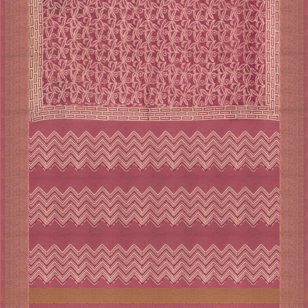 Pink Chanderi silk cotton saree with white floral print, gold zari border and striped pallu