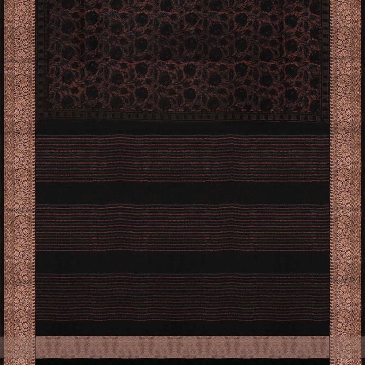 Black Chanderi silk cotton saree with white floral print, brown zari border and striped pallu