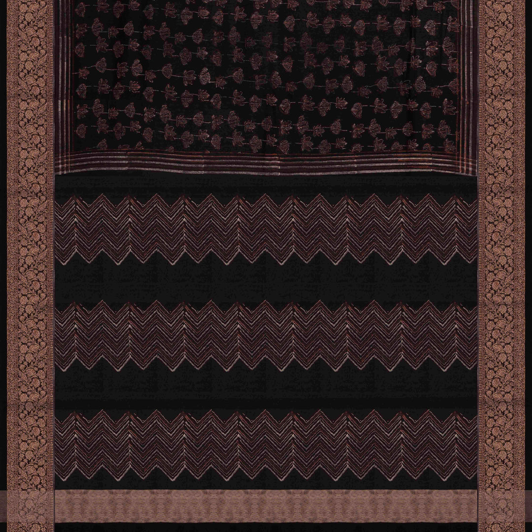 Black Chanderi silk cotton saree with white lotus floral print, gold zari border and orange striped pallu