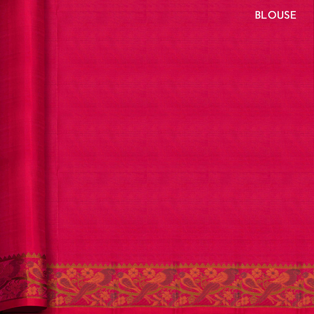 Pink handwoven Kanjivaram silk saree with parrot motifs, temple border and monotone pallu